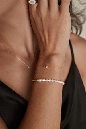 gold solitaire diamond bracelet