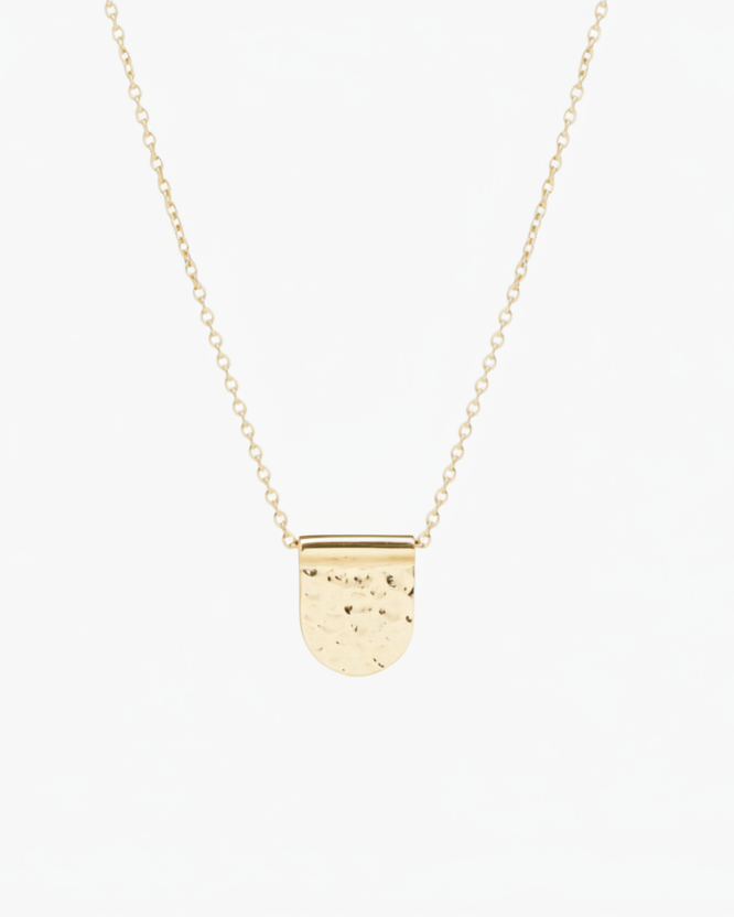 A gold-plated hammered charm necklace with a length of 16 inches, displayed against a light grey background.