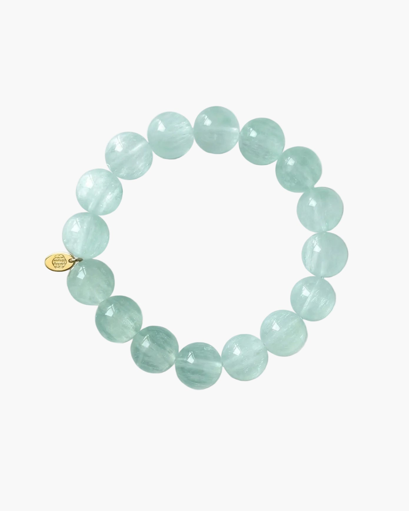 Light aqua green beaded bracelet on a white background