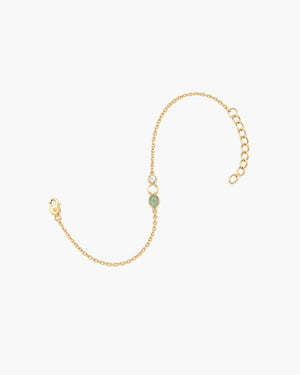 Lumenina Aurora Trio gold plated gemstone charm bracelet featuring malachite, white opal, and cubic zirconia.