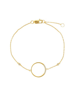 Gold bracelet with a circular design on a white background