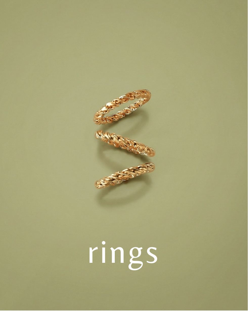 Three Gold rings on a green background with 'rings' text.