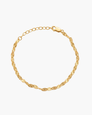 Gold chain bracelet on a white background