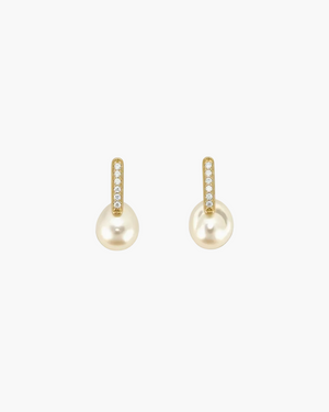 Pair of pearl earrings with gold accents on a white background