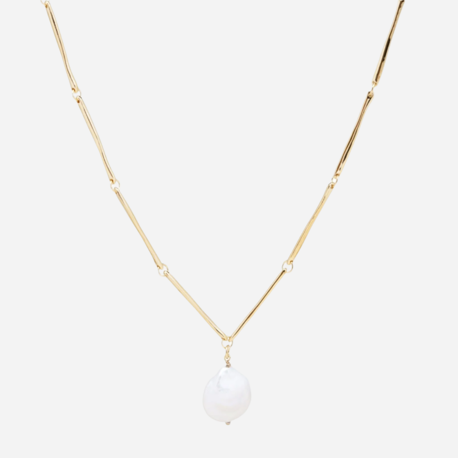 gold plated tube chain necklace with a coin pearl charm