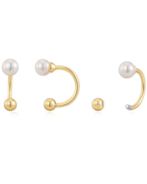 technical photo of reverse gold pearl huggie hoops