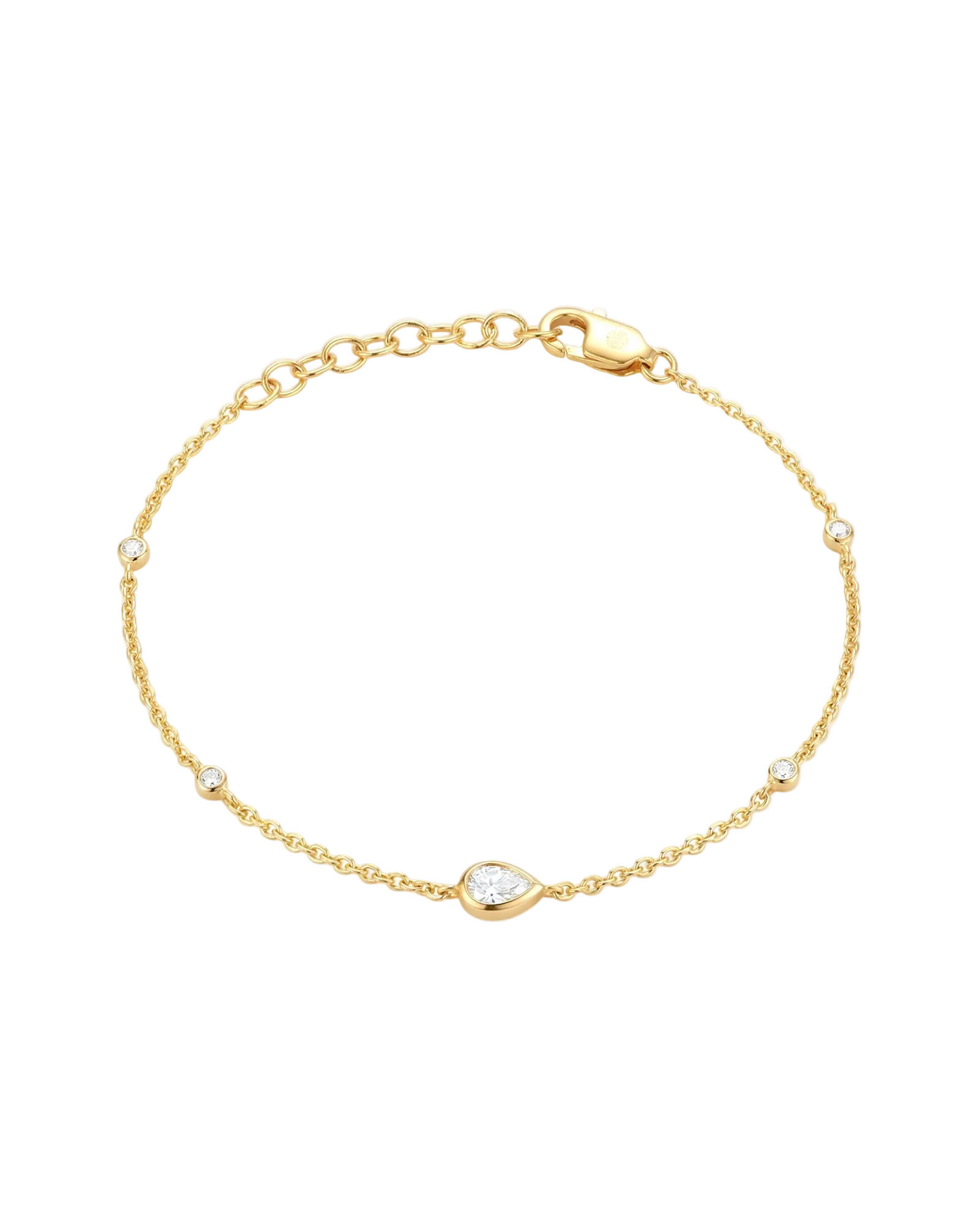 Gold bracelet with a small teardrop-shaped CZ on a light grey background