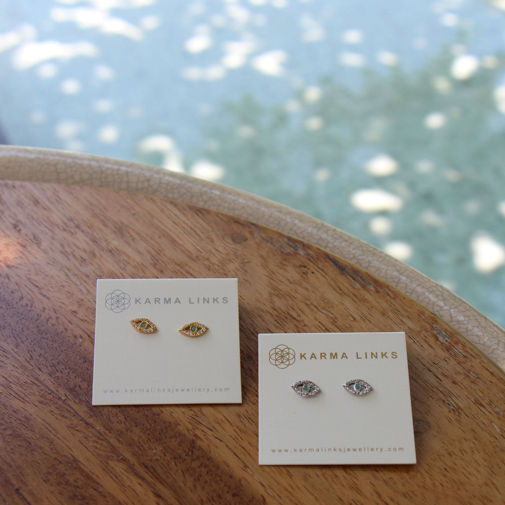 evil eye stud earrings - gold