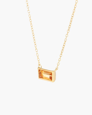 baguette citrine necklace in vermeil gold on white background