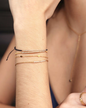 woman with 4 bracelets
